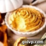 pumpkin whipped cream in mini pie plate with pumpkin spice
