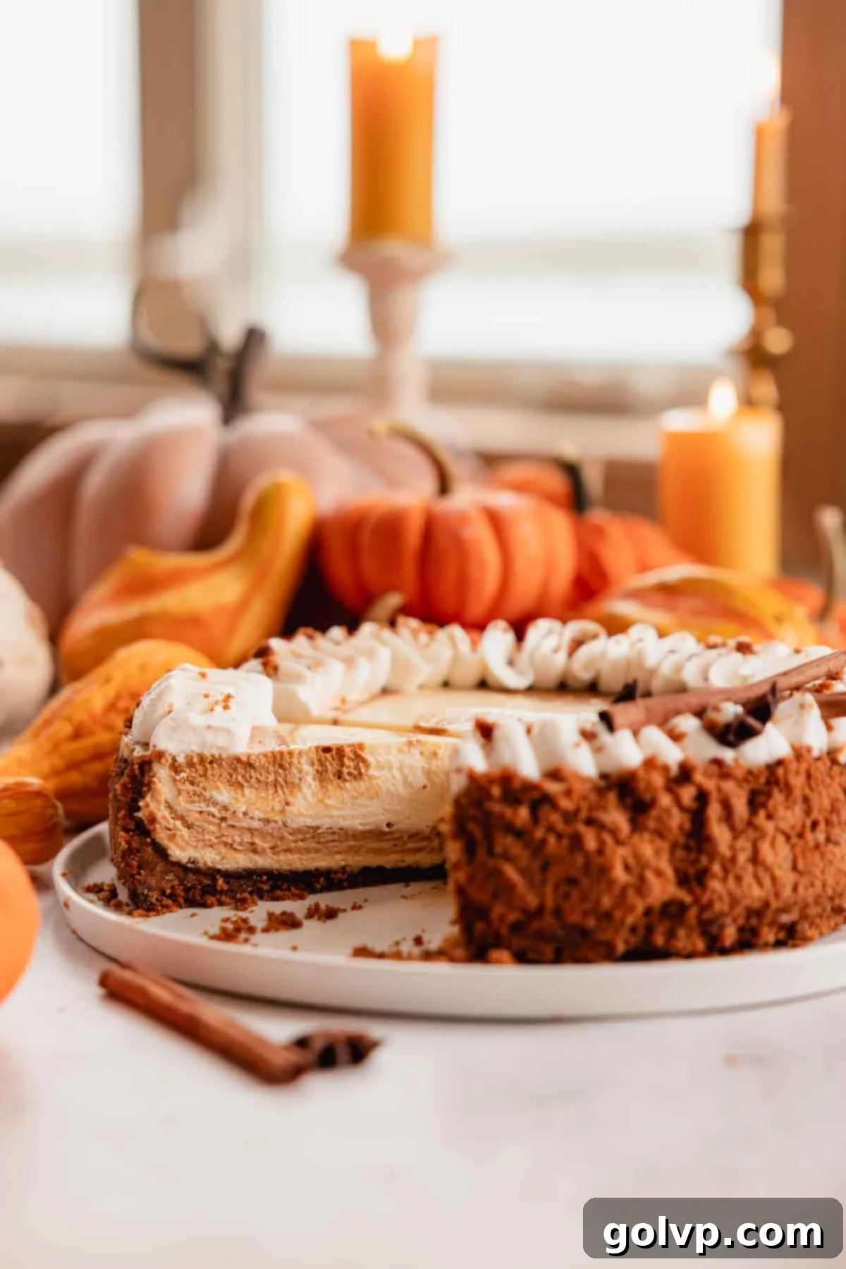 sliced creamy pumpkin pie cheesecake