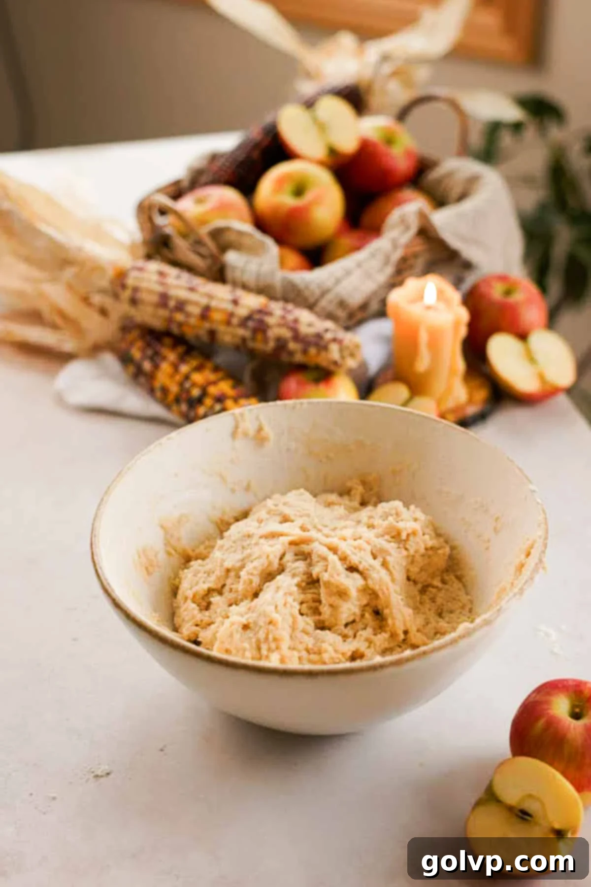 mixed together apple fritter dough in a large bowl