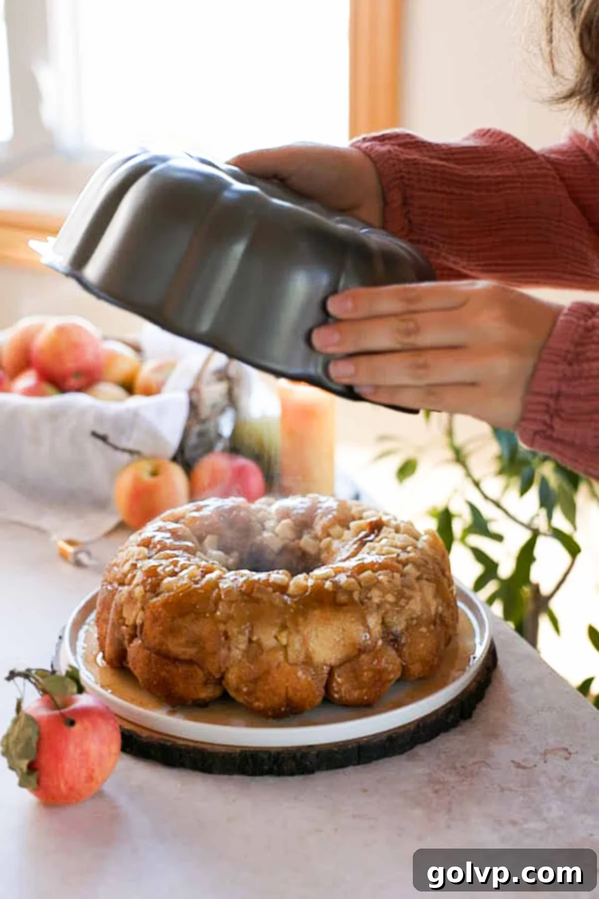 releasing apple monkey bread from bundt pan