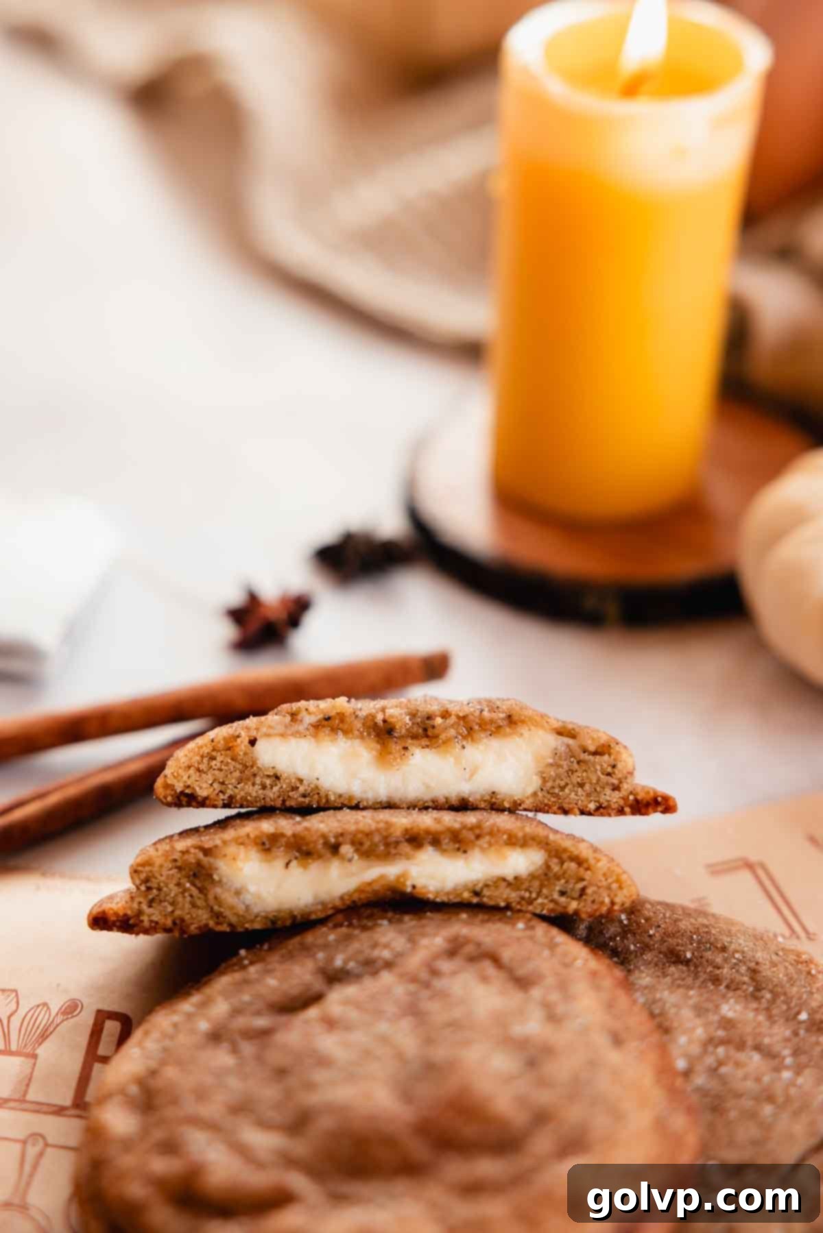 chai cookie cut in half with lit candle